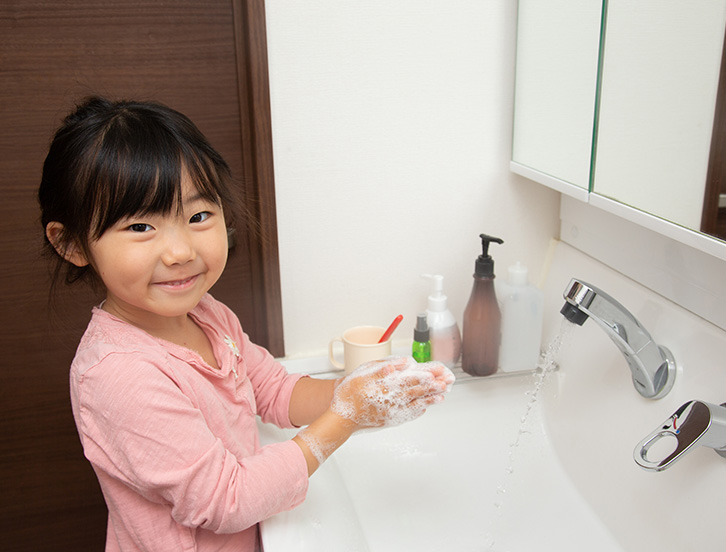 girl washing hands 